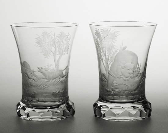 Cut and engraved glasses with hunting motives of lux and dogs